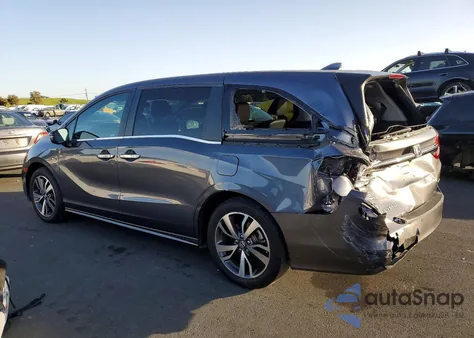 2022 Honda Odyssey Touring z USA, uszkodzony, nr VIN 5FNRL6H87NB067828